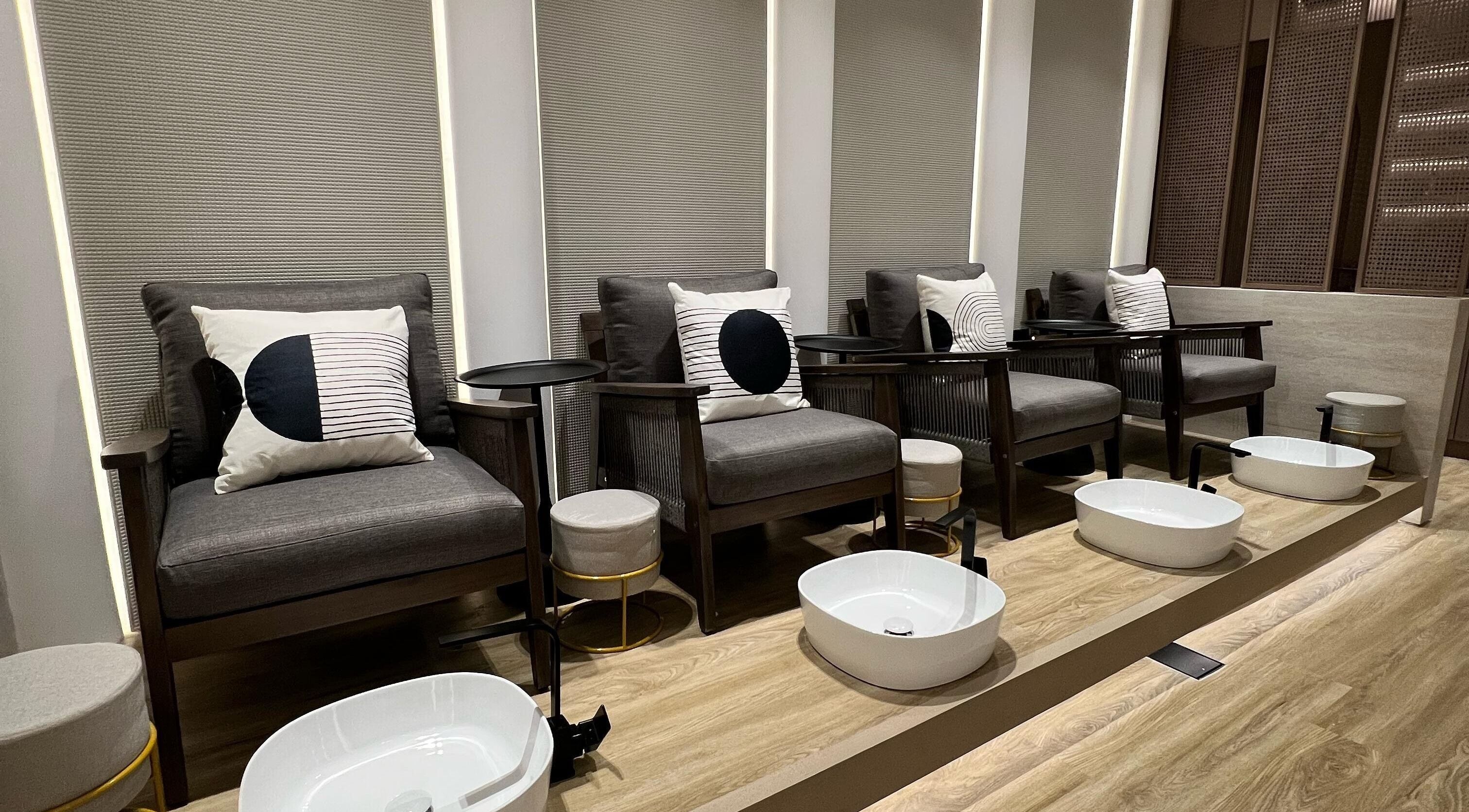 Comfortable pedicure seating at Mizu Beauty Lounge, Abu Dhabi, AE offering luxury relaxation.