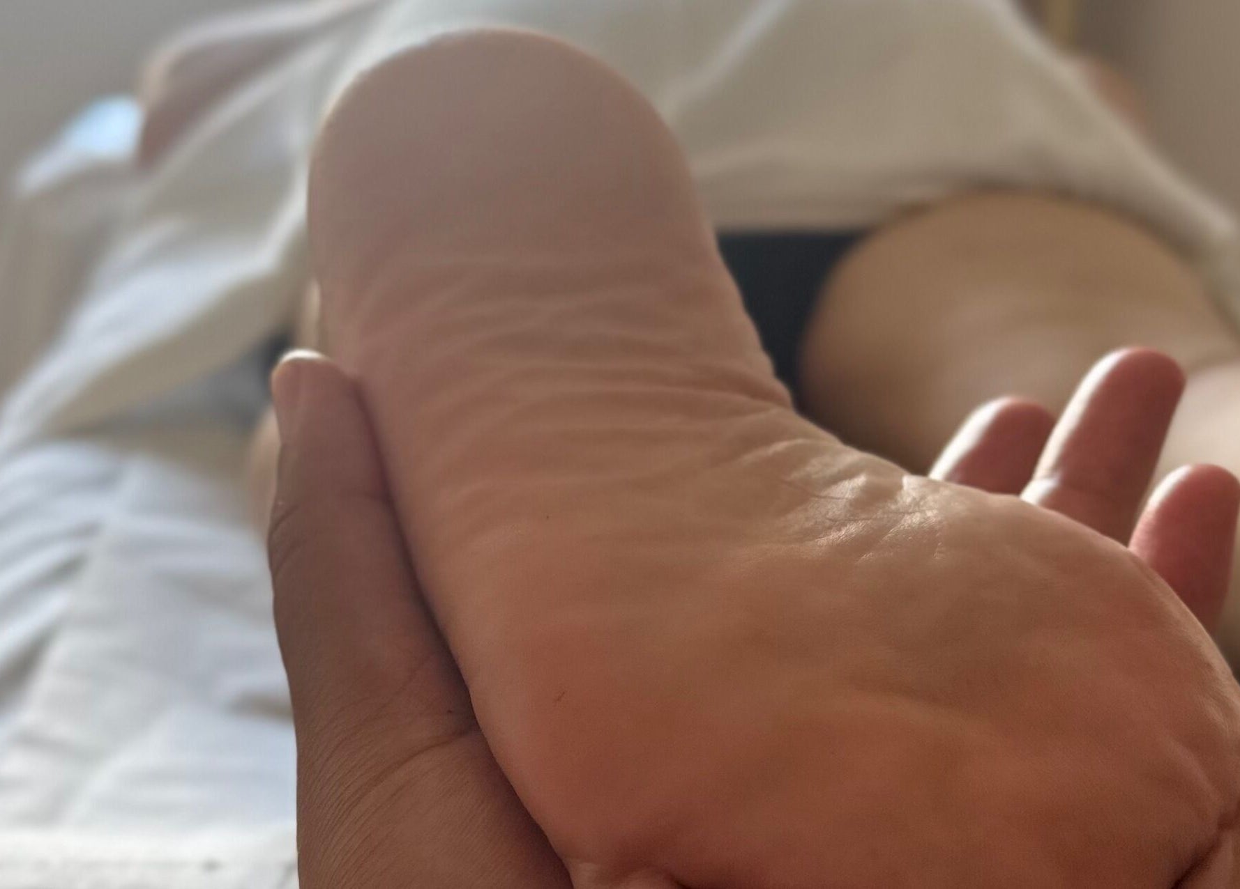 Sessão de massagem nos pés em Tratamentos Domiciliares, Almada, Setúbal, PT.