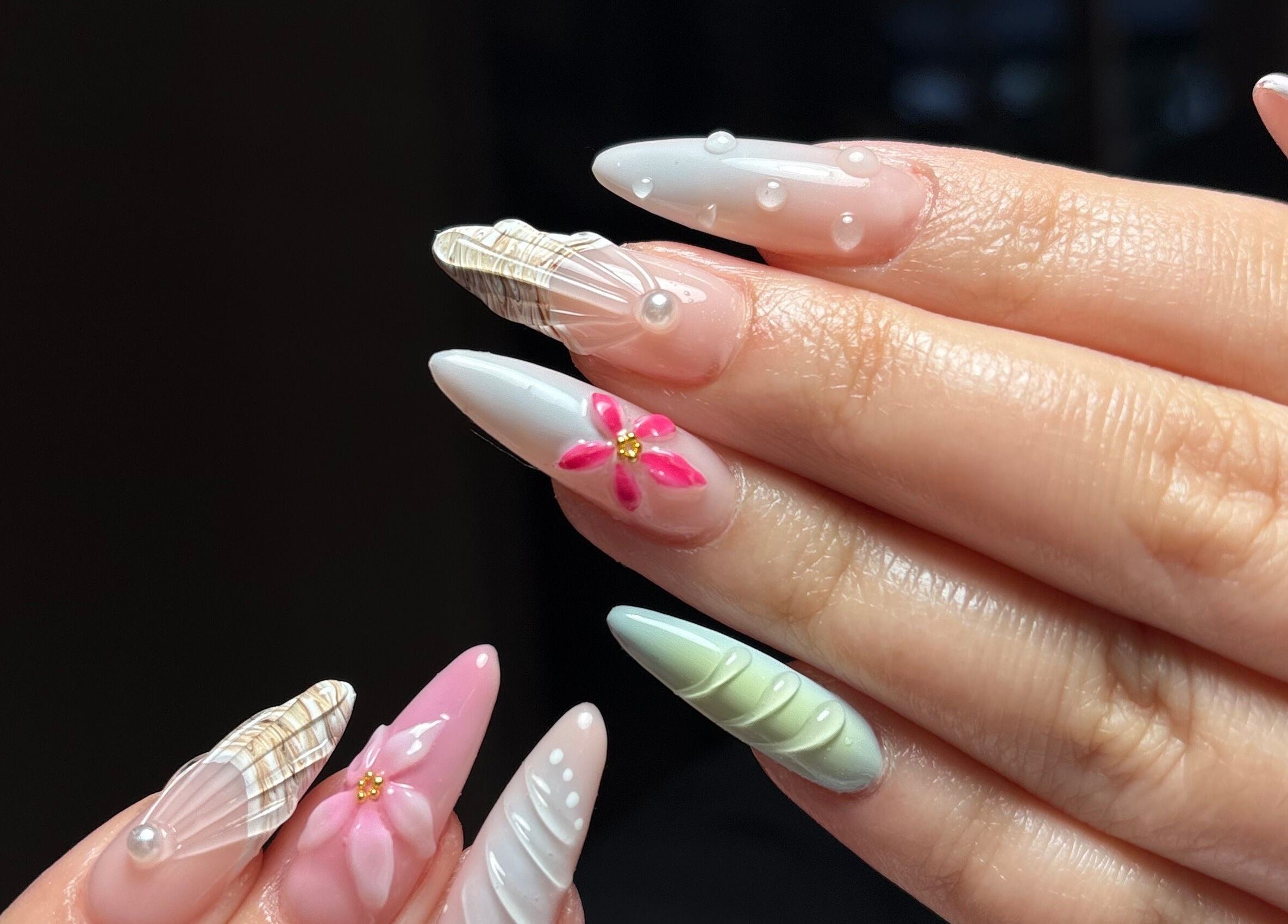 Detailed nail art by Clawed By Chl, Edmonton, Alberta, CA showcasing intricate designs and decorations.