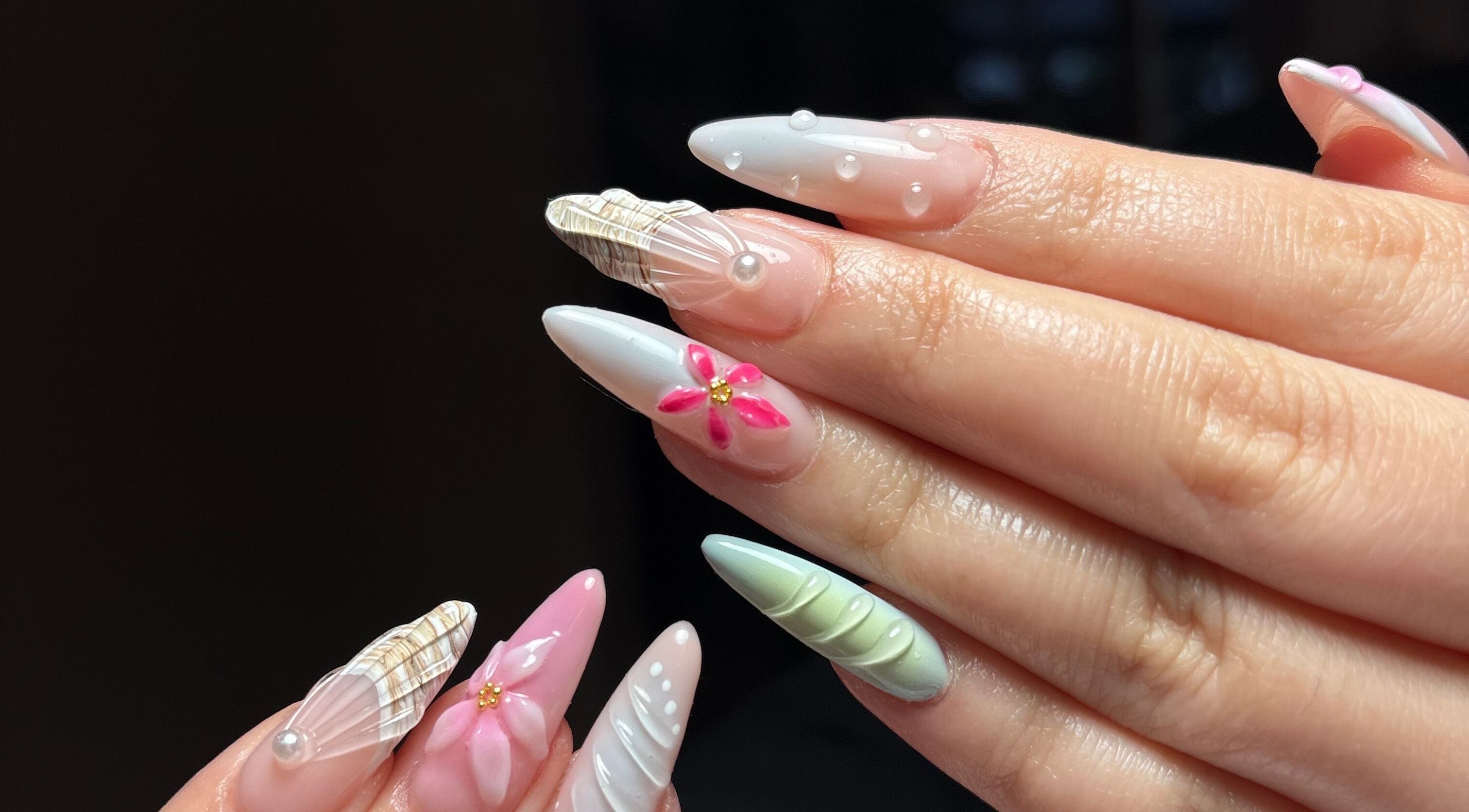 Detailed nail art by Clawed By Chl, Edmonton, Alberta, CA showcasing intricate designs and decorations.