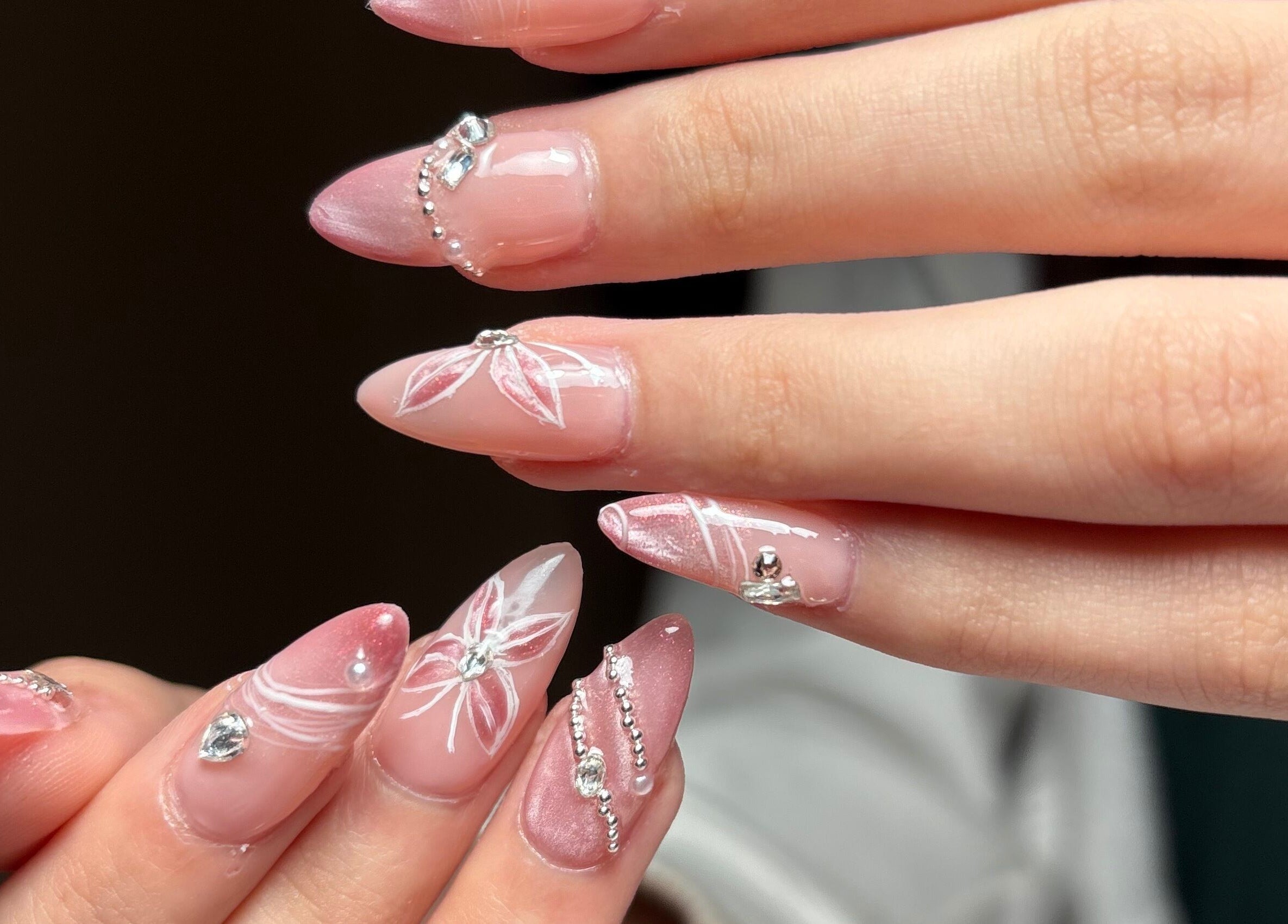 Elegant pink and white floral nail art with gems at Clawed By Chl, Edmonton, Alberta, CA.