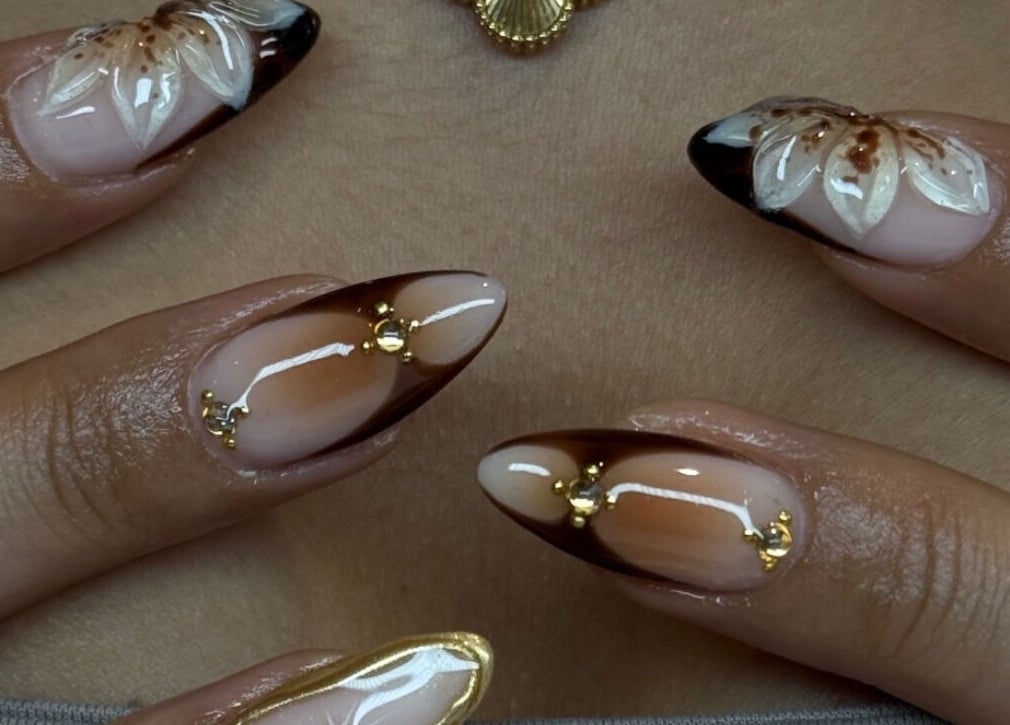 Elegant floral nail art at AK Nails in Thornton, New South Wales, AU, featuring intricate designs and glossy finish.