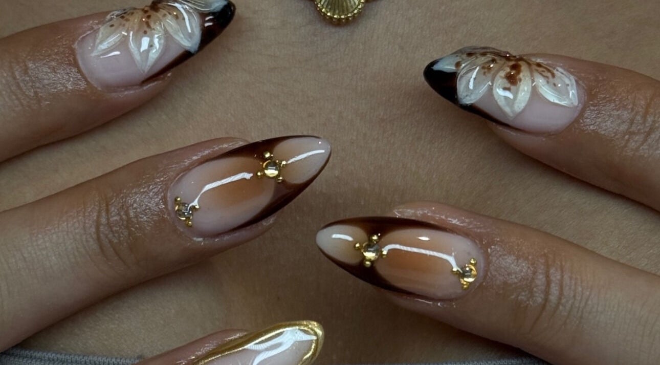 Elegant floral nail art at AK Nails in Thornton, New South Wales, AU, featuring intricate designs and glossy finish.