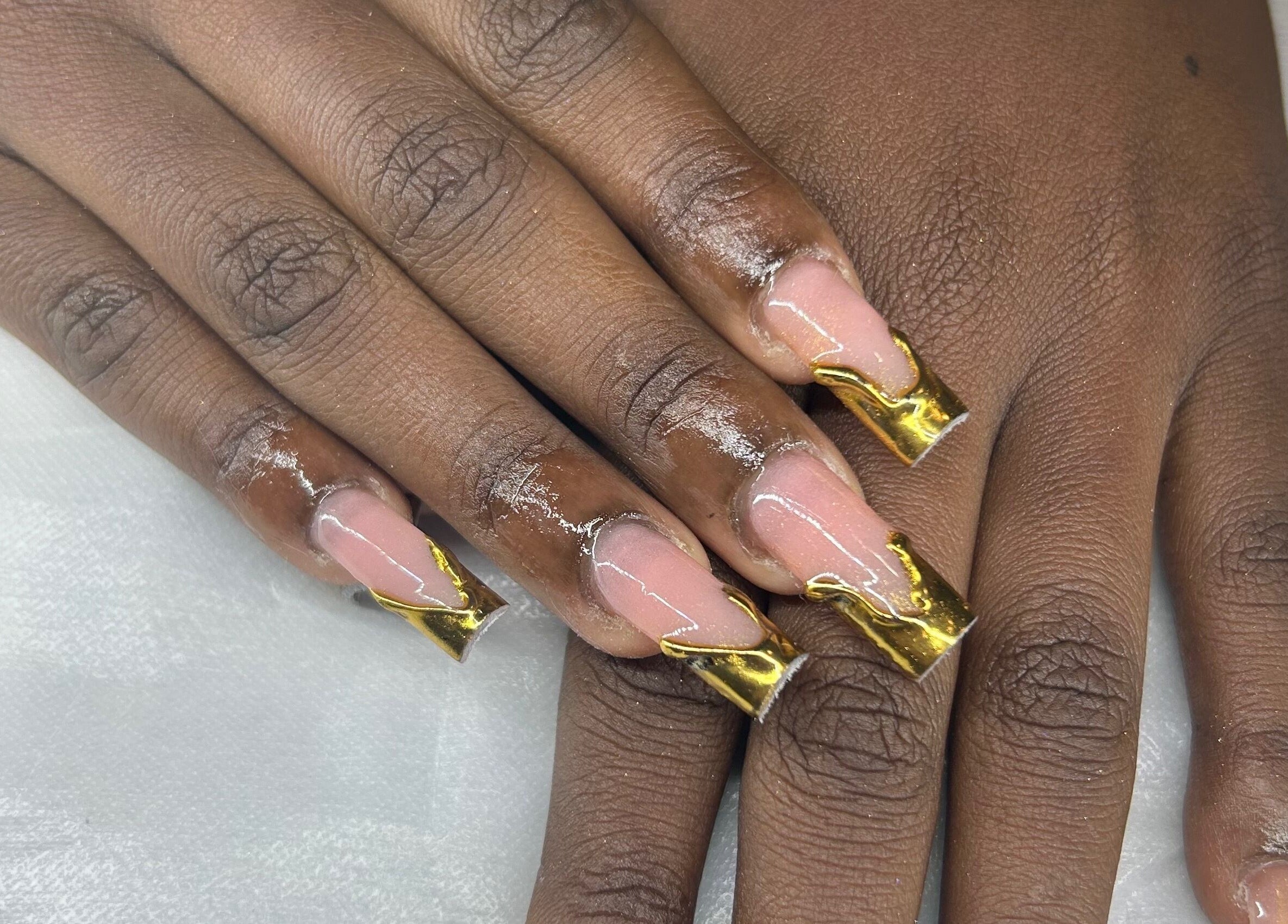 Stylish gold-accented nail art at AK Nails, Thornton, New South Wales, AU.