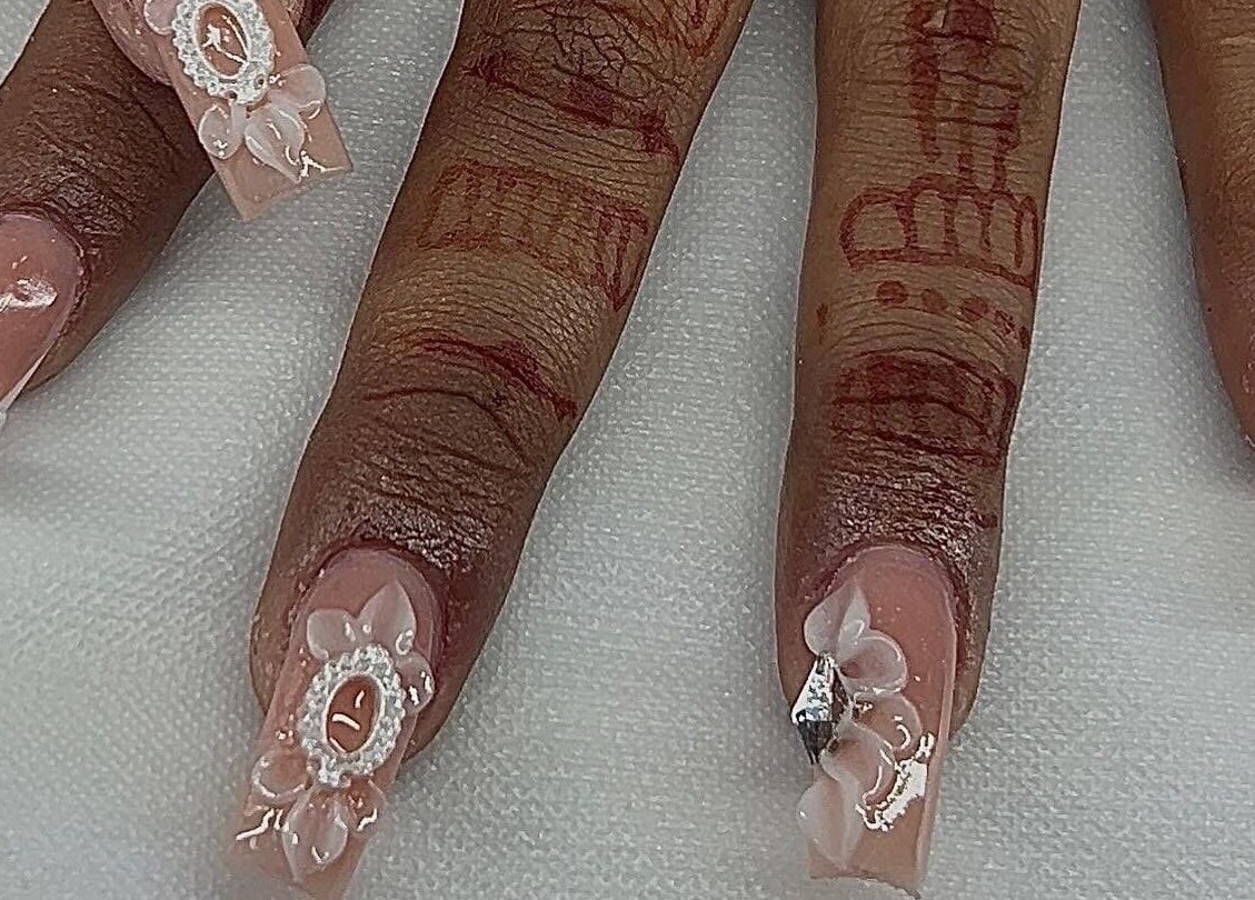 Exquisite floral 3D nail art by AK Nails at Thornton, New South Wales, AU, showcasing intricate design.
