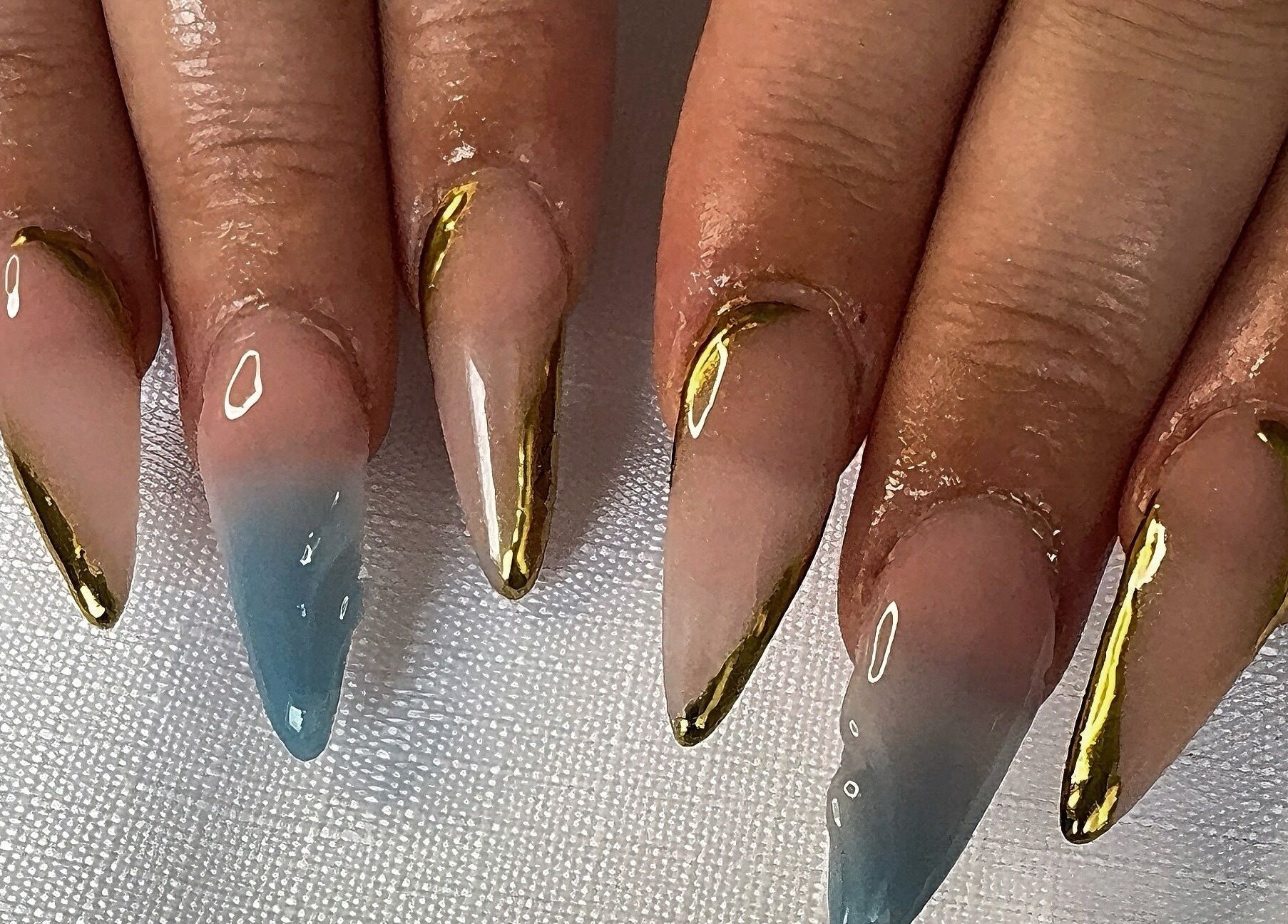 Stylish nail art with gold tips at AK Nails, Thornton, New South Wales, AU.