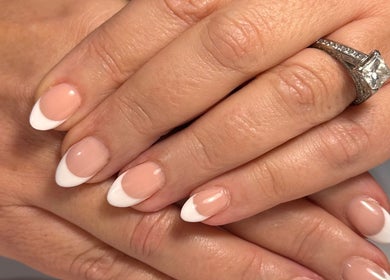 Close-up of elegant French manicure at Nails By Cee, Brookvale, New South Wales, AU. Perfectly manicured hands.