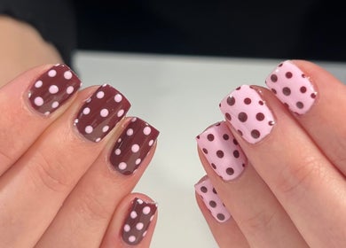 Stylish polka dot nails at Nails By Cee in Brookvale, New South Wales, AU. Trendy manicure design.