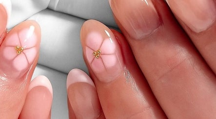 Elegant petal nail art with gold accents at Nails By Cee, Brookvale, New South Wales, AU.