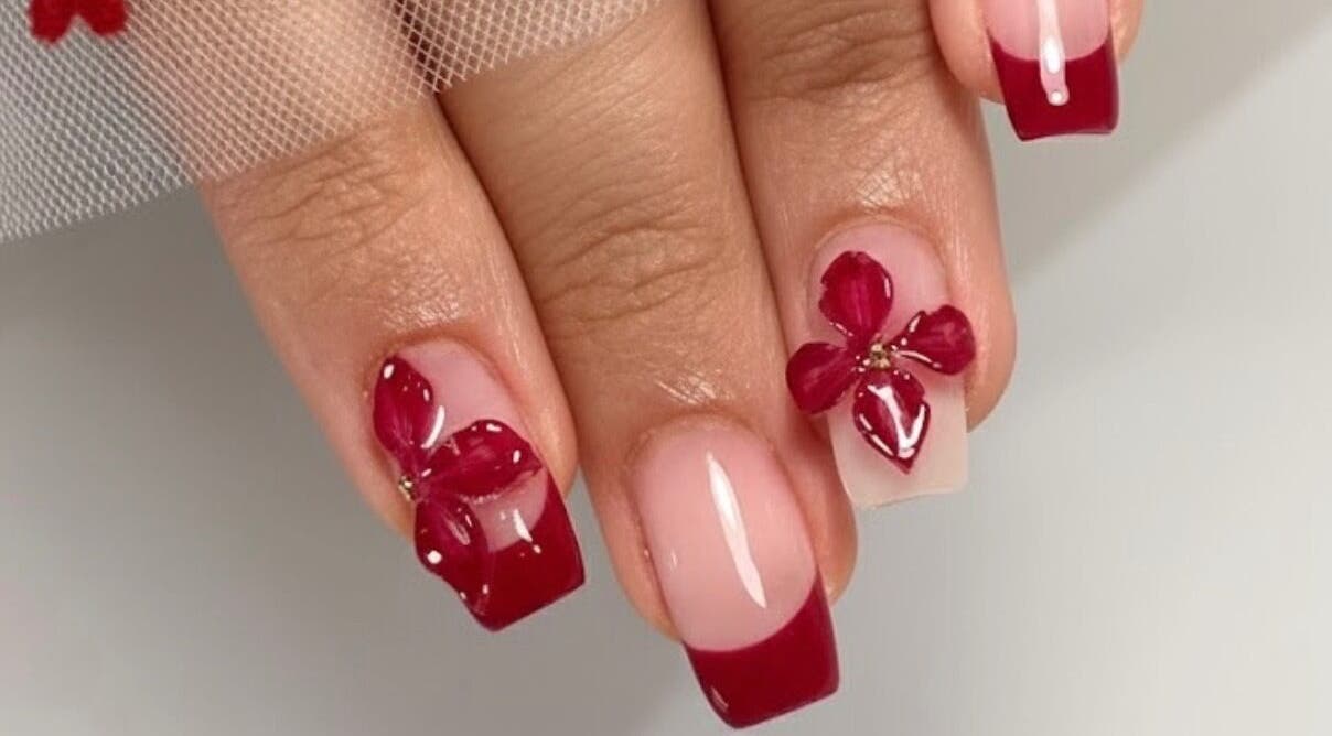 Elegant red flower nail art at Nails By Cee, Brookvale, New South Wales, AU.
