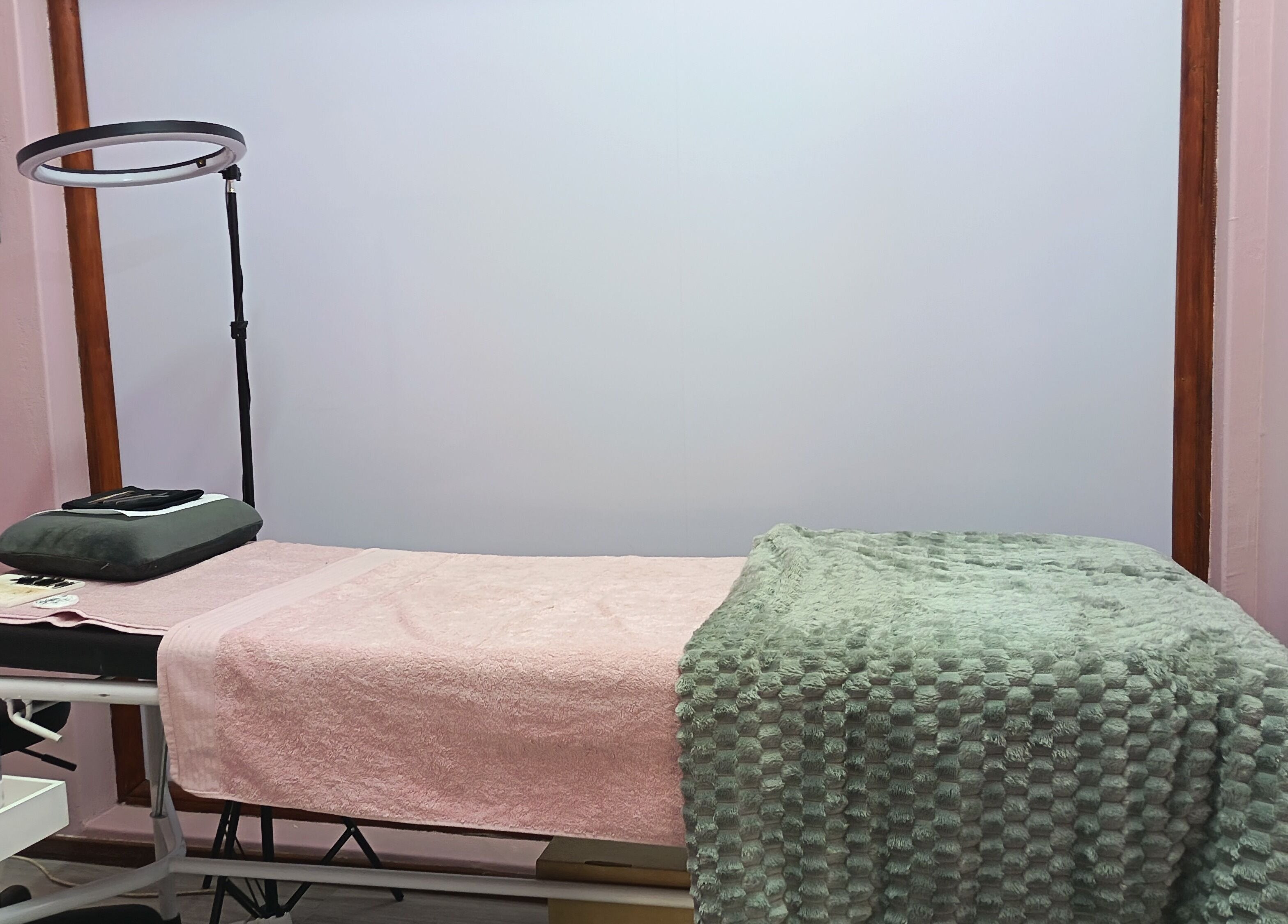 Treatment room at The Glam Lab, Hartbeespoort, North West, ZA with cozy setup for relaxation.