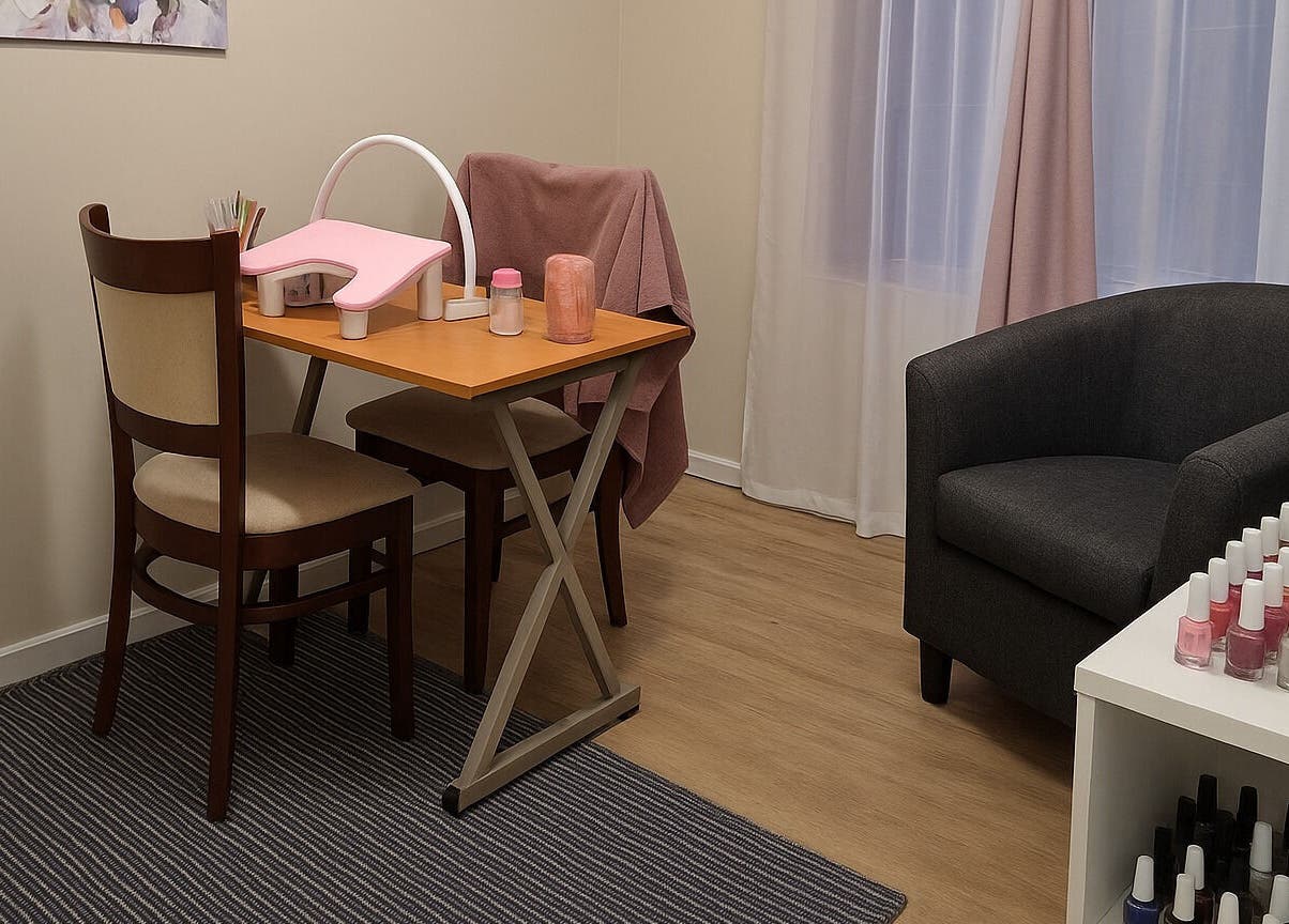 Cozy nail salon table at Firefly Nails in Cape Town, Western Cape, ZA, with vibrant polish display.