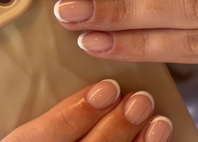 Elegant French manicure by Nails By Jayden, Glasgow, Scotland, GB showcasing subtle pink tones.