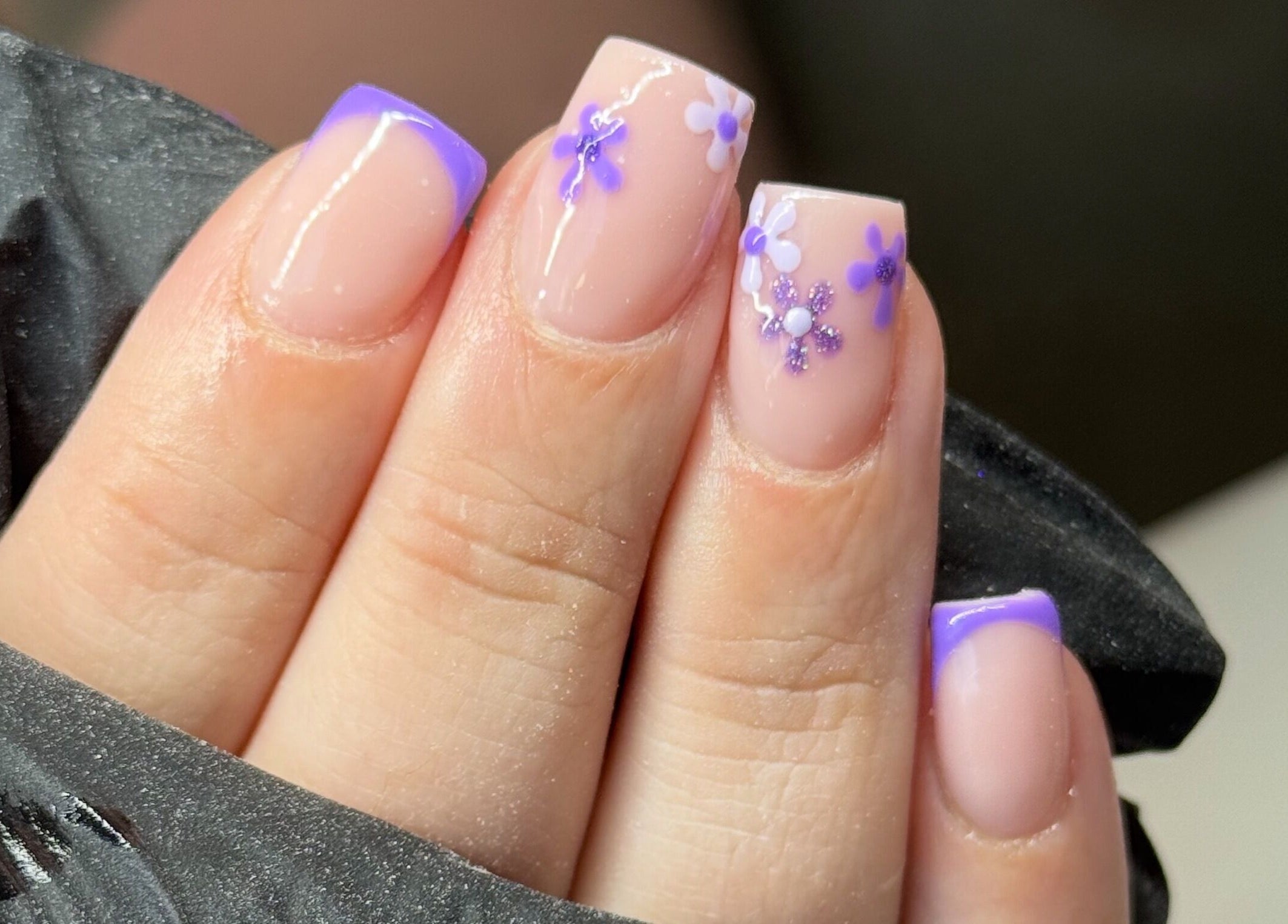 Lavender floral nail art at NailsbyHollie, Tyldesley, England, GB, showcasing intricate flower designs.