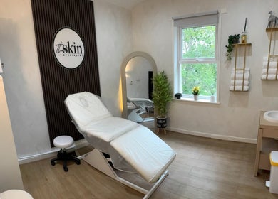 Cozy treatment room at The Skin Specialist UK in Horwich, England, GB with elegant decor and soft lighting.