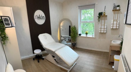 Cozy treatment room at The Skin Specialist UK in Horwich, England, GB with elegant decor and soft lighting.