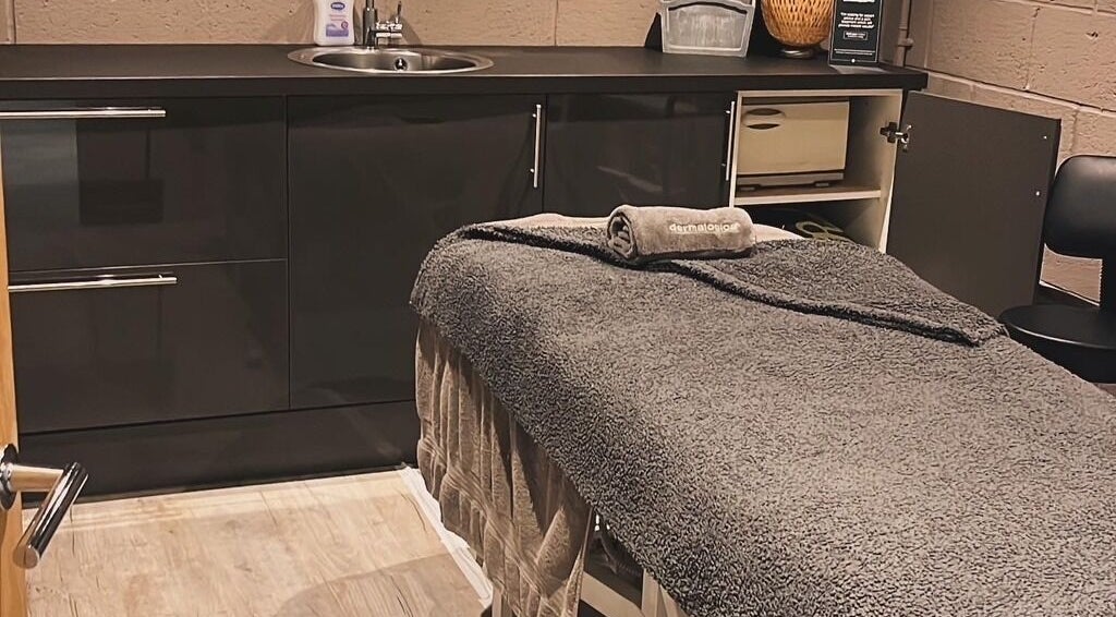 Calming treatment room at Beauty and Holistics by Lucie, Radstock, England, GB, with a plush massage table.