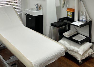 Treatment room at Zita Skin Clinic, Marylebone, England, GB with a comfortable treatment bed and modern amenities.