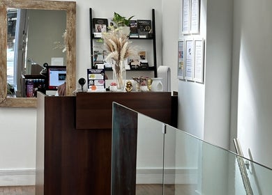 Elegant reception at Zita Skin Clinic in Marylebone, England, GB, showcasing modern decor and warm ambiance.