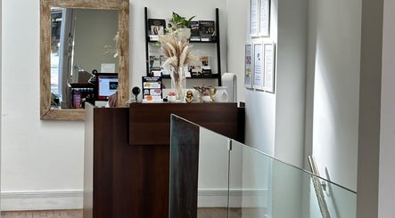Elegant reception at Zita Skin Clinic in Marylebone, England, GB, showcasing modern decor and warm ambiance.