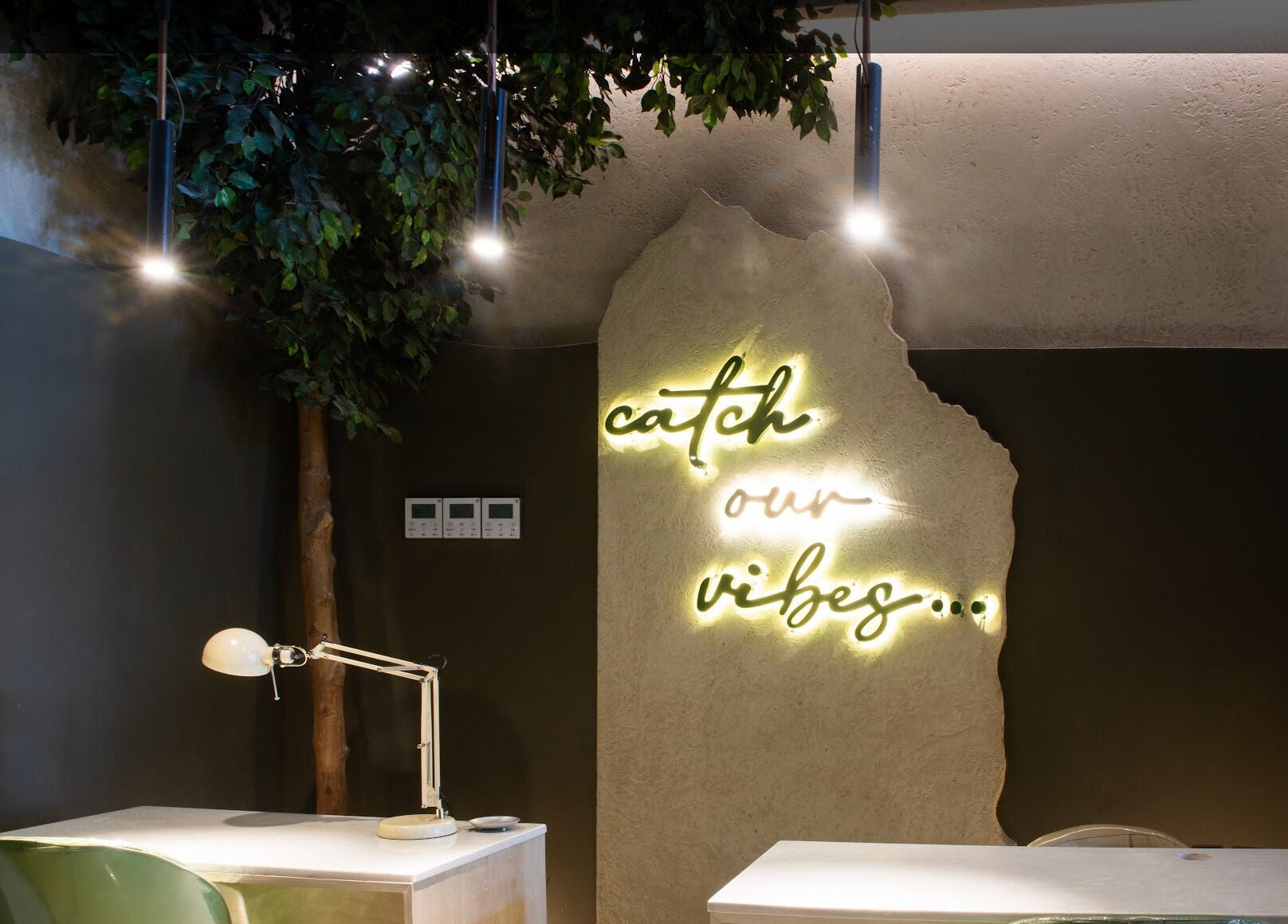Neon sign 'catch our vibes' at Nails Aholic - Ar Rahmaniyyah, Riyadh, Riyadh Province, SA.