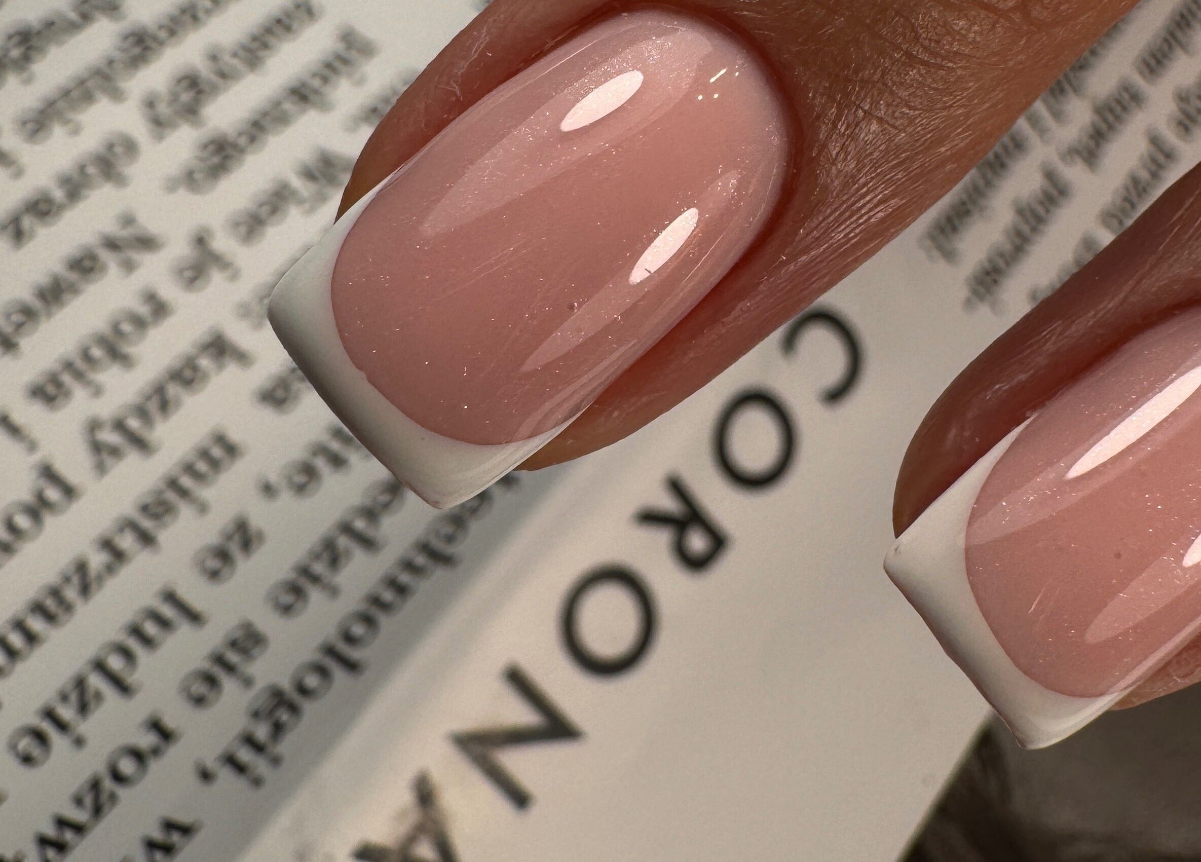 French manicure at Dangina Studio, Aurora, Illinois, US illustrating elegant nail detail.