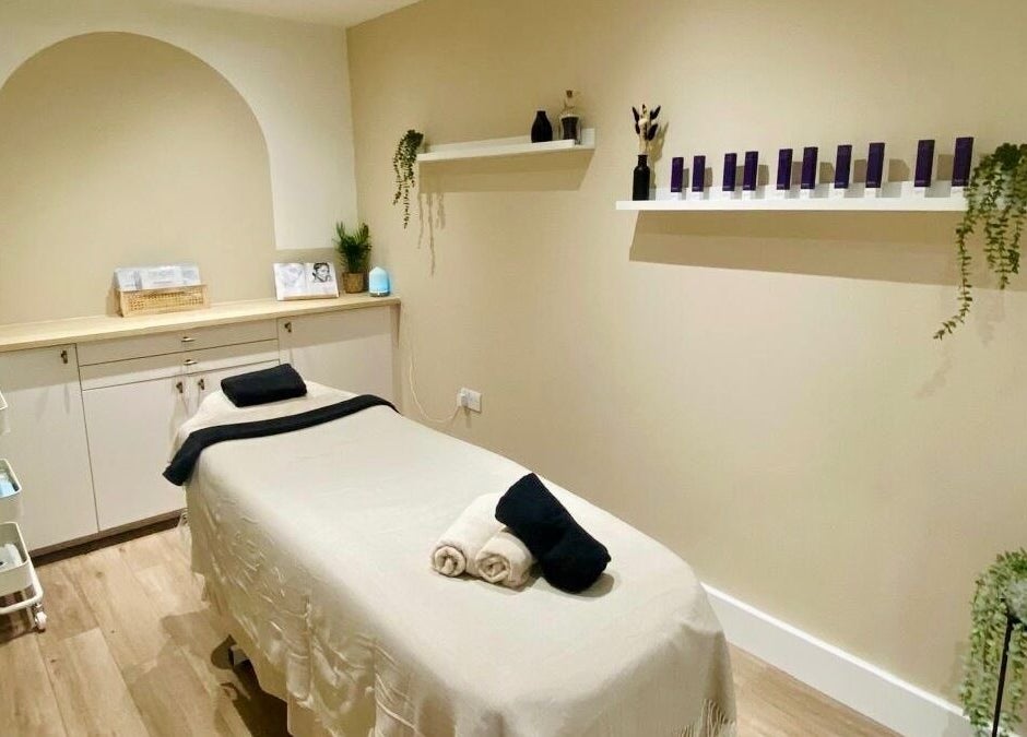 Relaxing treatment room at Amber Rose Cosmetics, Wombourne, England, GB, featuring elegant decor and amenities.