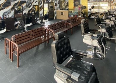 Spacious interior of Mco Barbershop D'anjung with stylish chairs, Shah Alam, Selangor, MY.