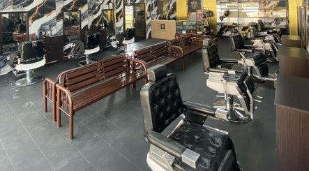 Spacious interior of Mco Barbershop D'anjung with stylish chairs, Shah Alam, Selangor, MY.