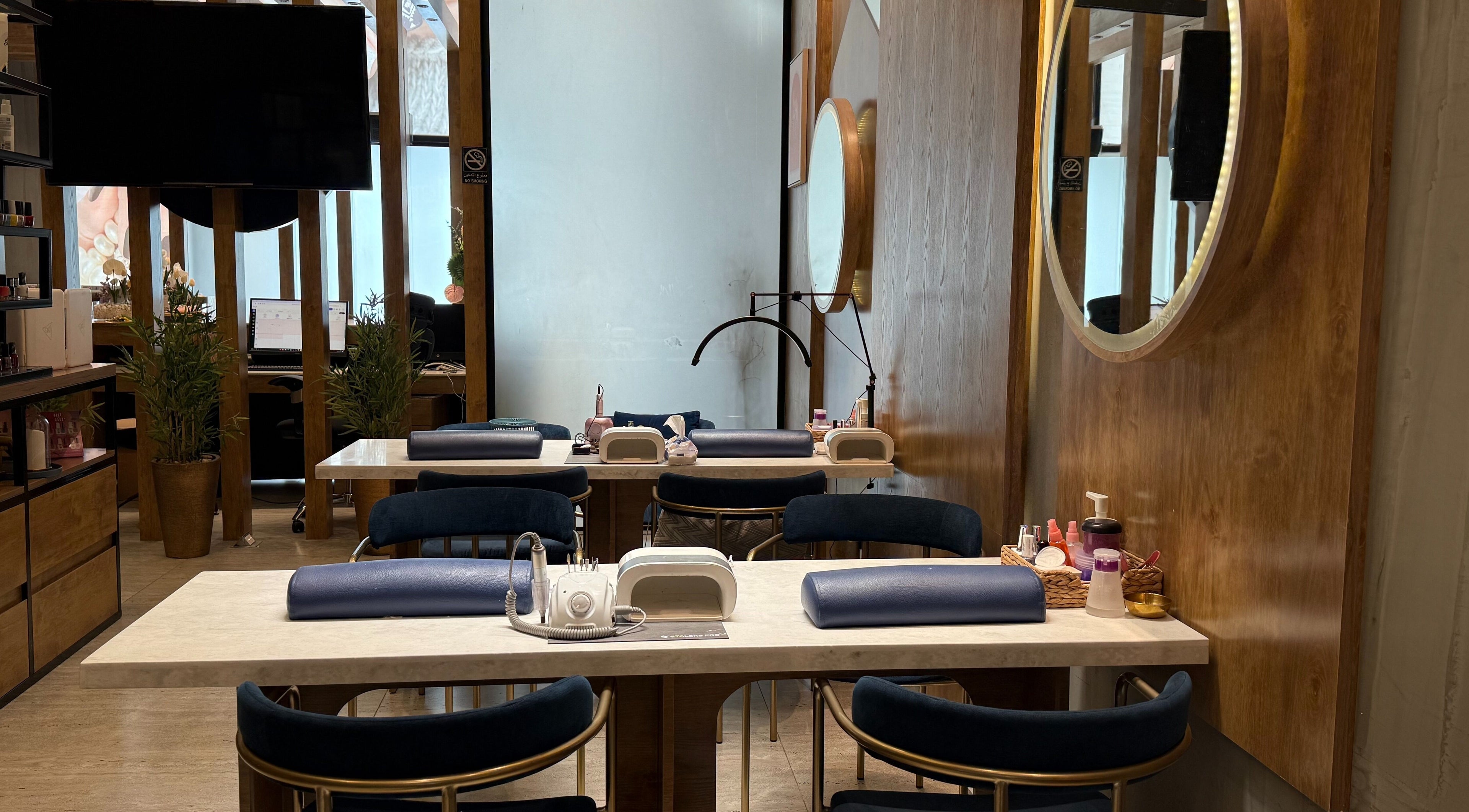 Nail service stations at Meraki Salon I ميراكي صالون, Al Khobar, Eastern Province, SA, featuring modern decor.