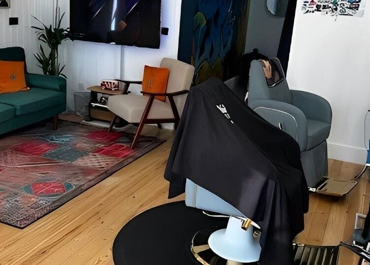 Contemporary lounge area at Spendlow's Barbering, Newark-on-trent, England, GB. Cozy seating with stylish decor.