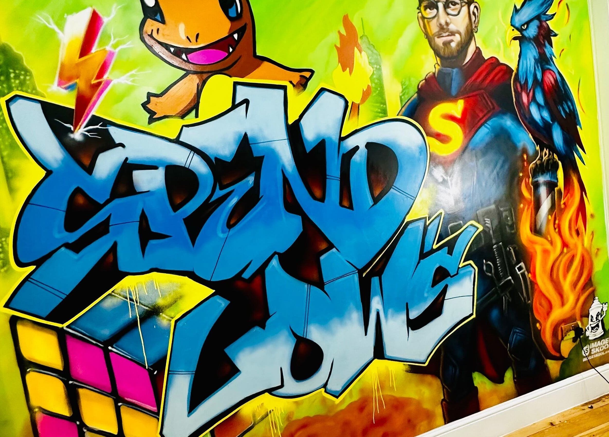 Colorful mural at Spendlow's Barbering in Newark-on-trent, England, GB featuring bold graffiti and characters.