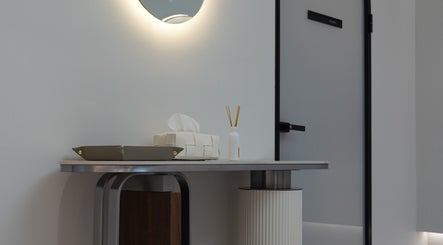 Minimalist corner with a mirror at Gloss Skin Boutique, Singapore, Singapore, SG, showcasing elegance.