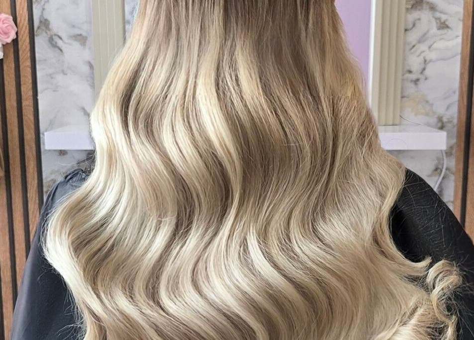 Luxurious blonde extensions at Deluxe Aurora Hair Extensions in Stoke-on-Trent, England, GB.