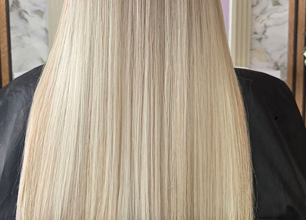 Silky blonde hair extensions at Deluxe Aurora Hair Extensions, Stoke-on-Trent, England, GB.