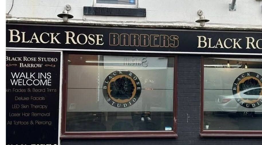 Front view of Hard Knoxx Barbers in Barrow-in-furness, England, offering diverse grooming services.