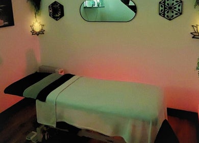 Peaceful therapy room at Tranquility Well-Being, Cromer, England, GB, with soft lighting and relaxing decor.
