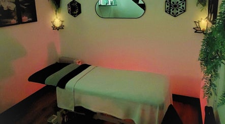 Peaceful therapy room at Tranquility Well-Being, Cromer, England, GB, with soft lighting and relaxing decor.