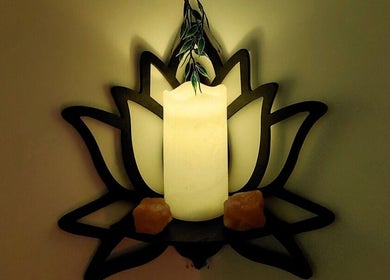 Serene candle on lotus holder at Tranquility Well-Being, Cromer, England, GB, for a calming atmosphere.