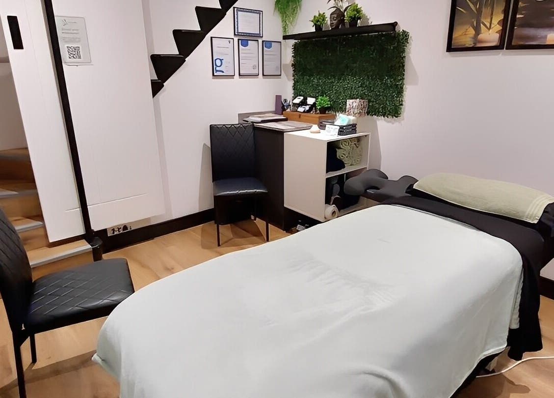 Tranquility Well-Being spa room with massage table in Cromer, England, GB.