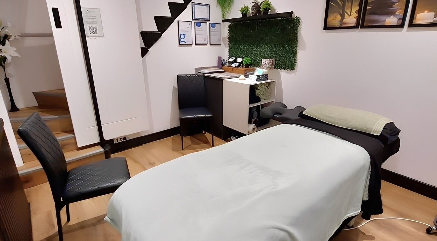 Tranquility Well-Being spa room with massage table in Cromer, England, GB.