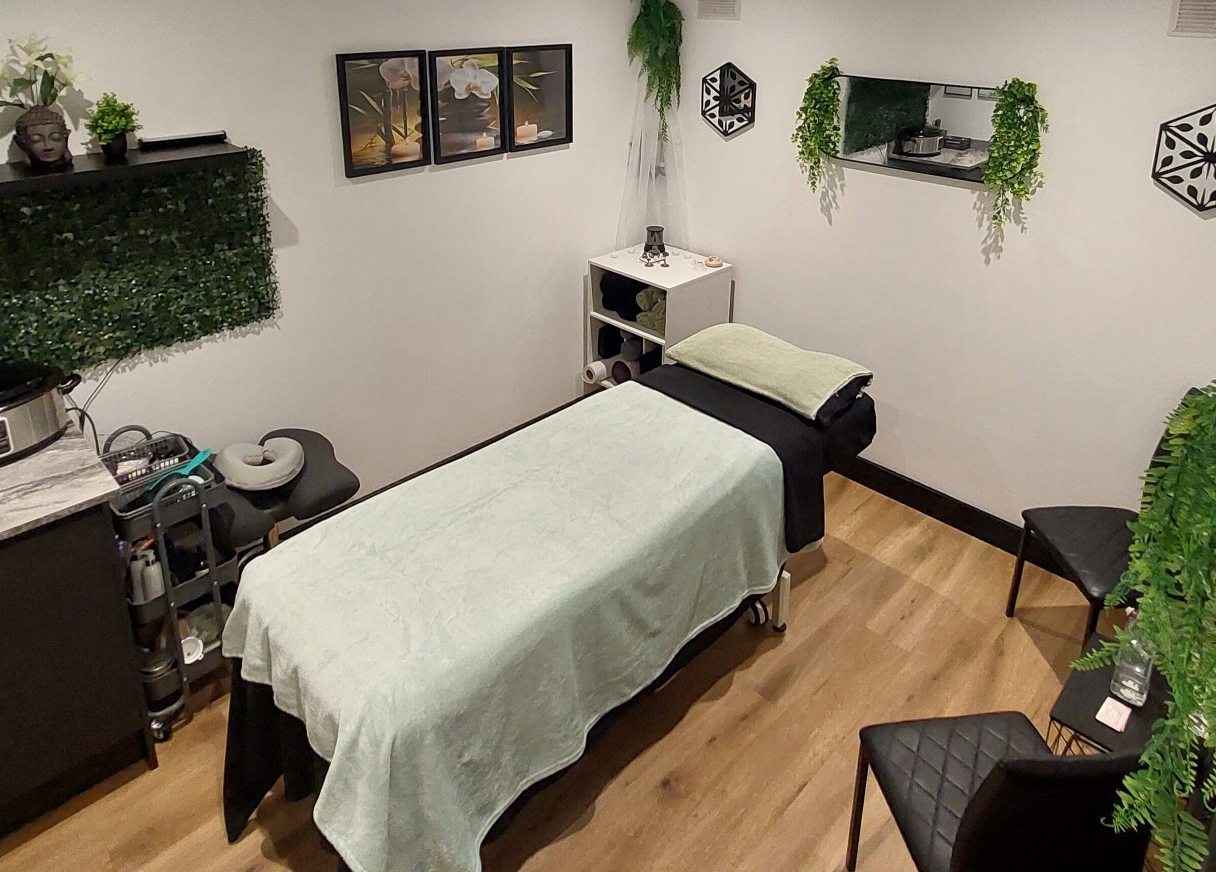 Tranquility Well-Being massage room with lush decor in Cromer, England, GB.