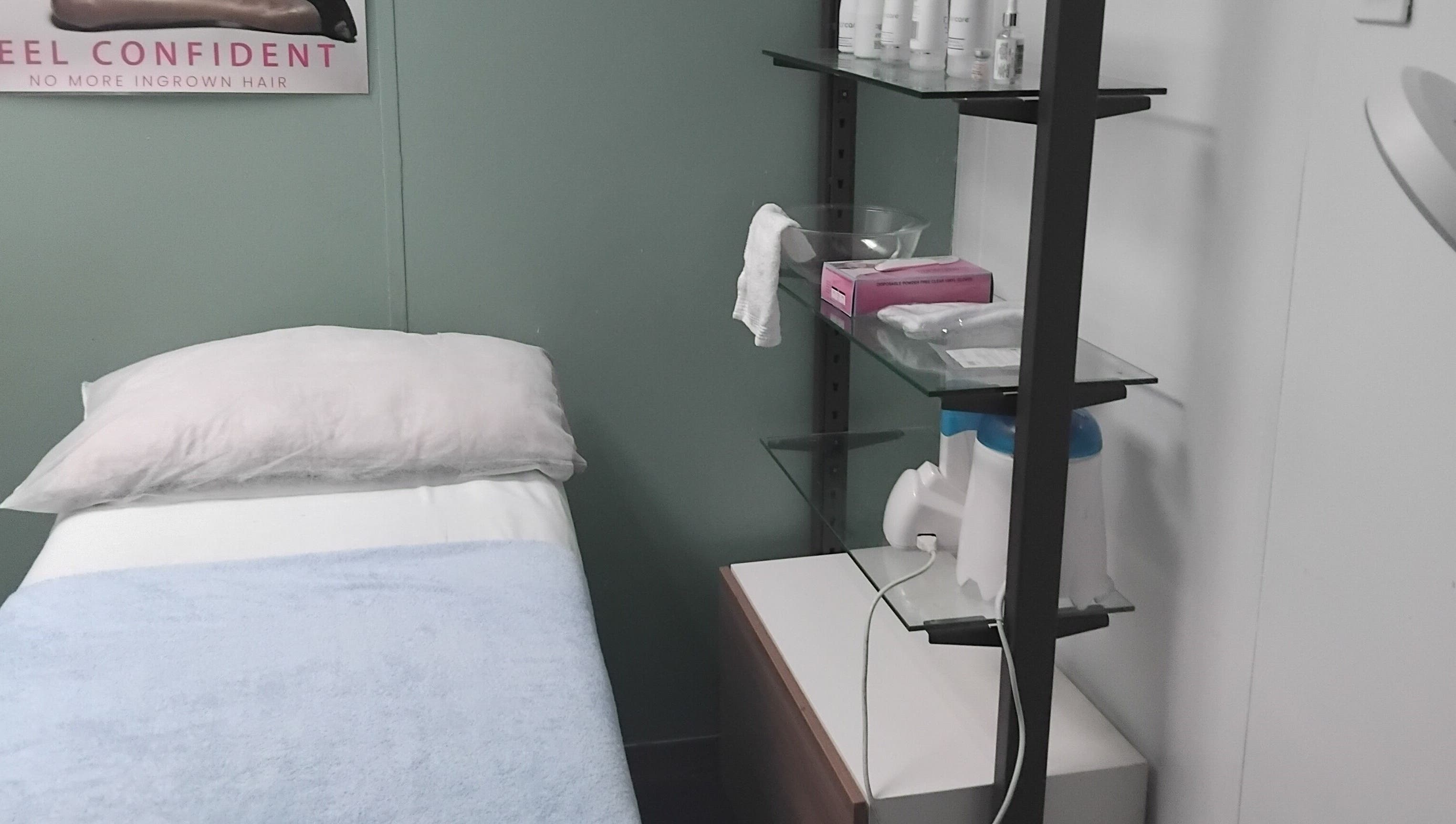 Cozy treatment room at The Breeze Wax Studio in Johannesburg, Gauteng, ZA, featuring a comfortable bed.