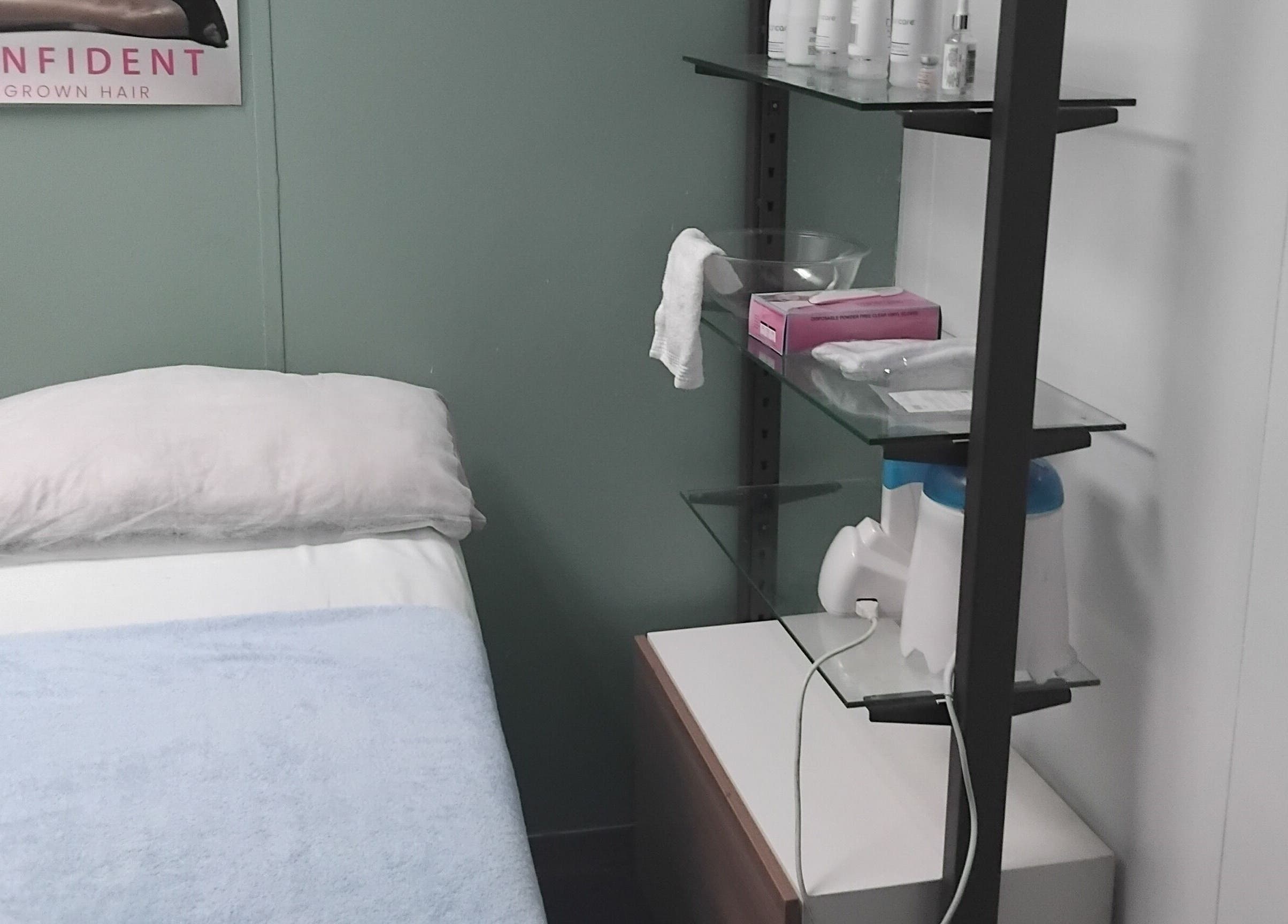 Cozy treatment room at The Breeze Wax Studio in Johannesburg, Gauteng, ZA, featuring a comfortable bed.