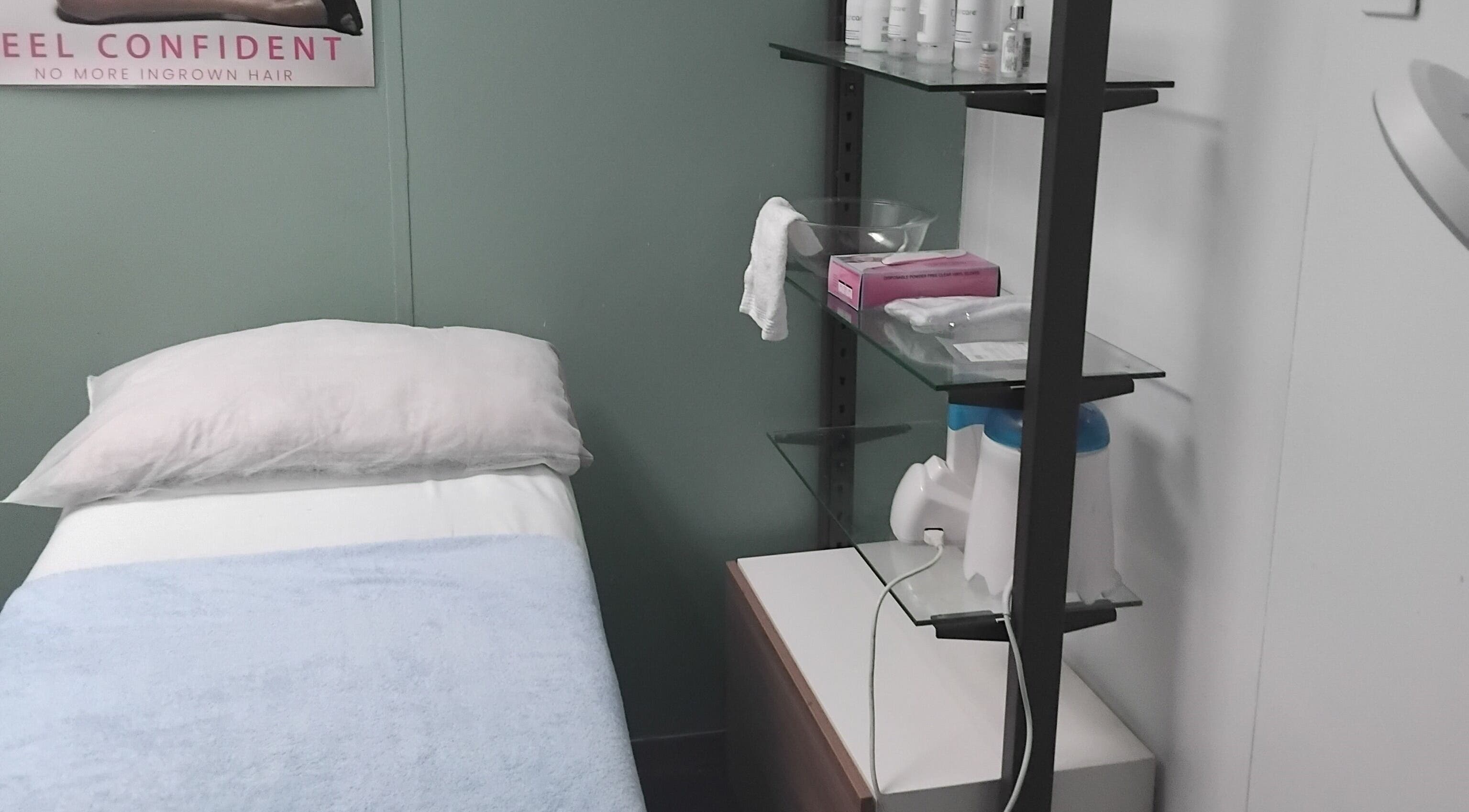 Cozy treatment room at The Breeze Wax Studio in Johannesburg, Gauteng, ZA, featuring a comfortable bed.