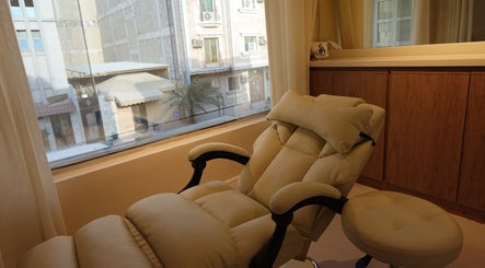 Relaxing spa chair in Eileen Spa, Al Khobar, Eastern Province, SA with city view in background.
