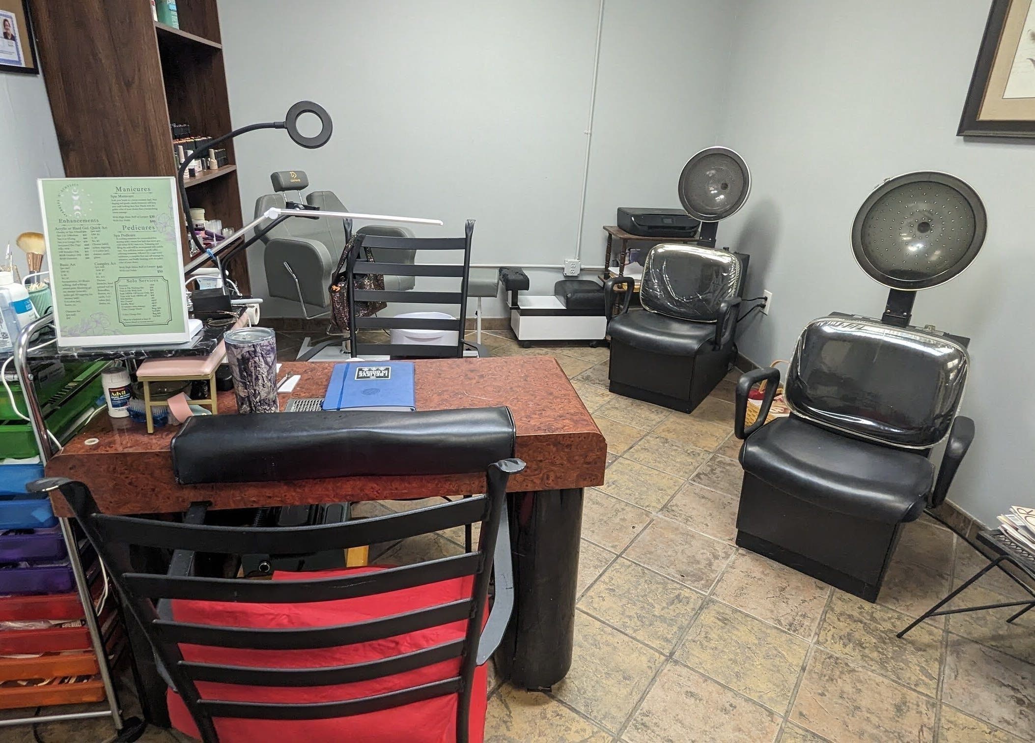 Interior of Sparkles Gel & Nail Art Studio in Camden, South Carolina, showcasing nail and hair stations.