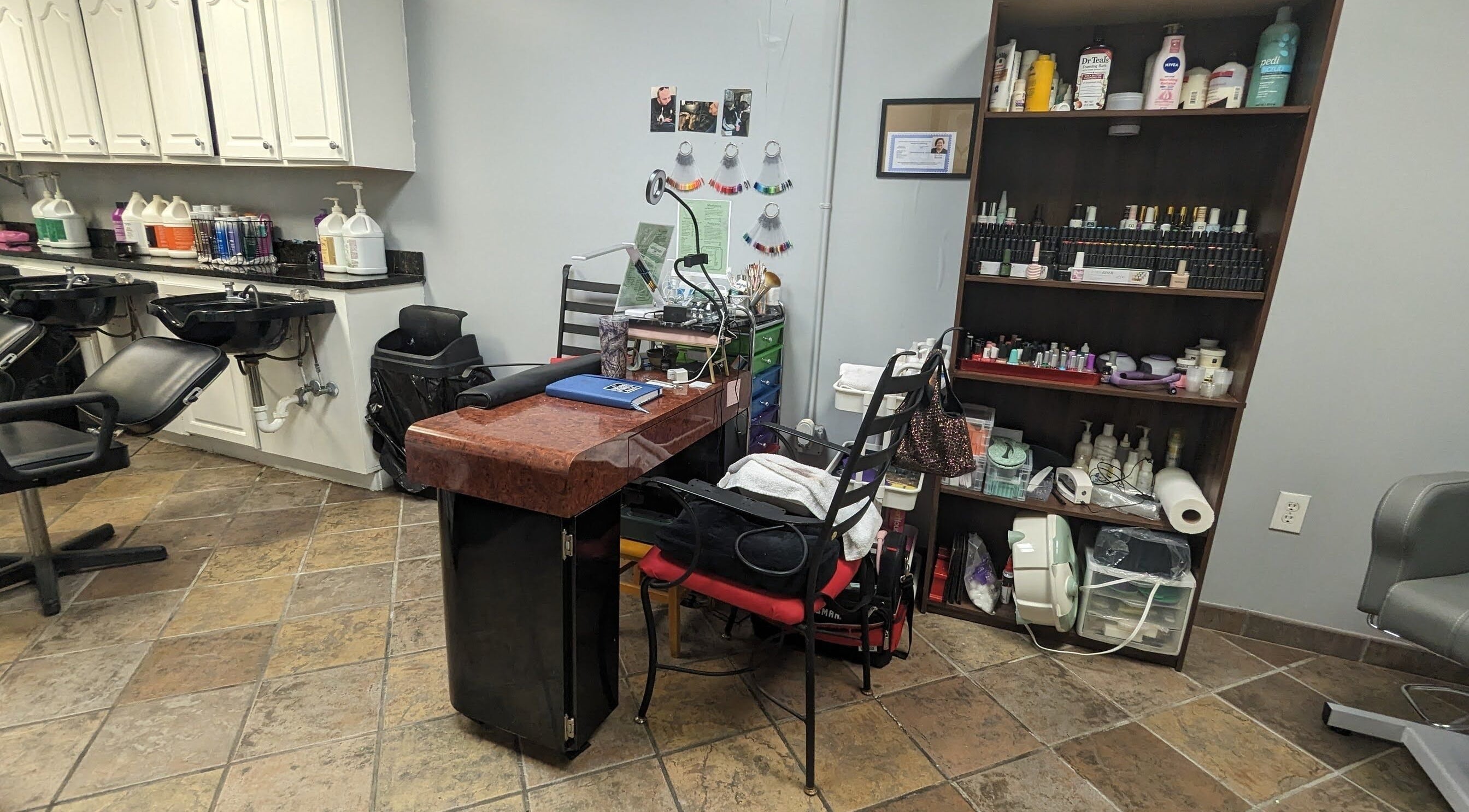 Nail art station at Sparkles Gel & Nail Art Studio, Camden, South Carolina, US, showcasing tools and products.
