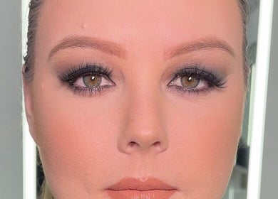 Elegant makeup look by Naomi Lee Makeup in Catherine Field, New South Wales, AU highlighting dramatic eyes.