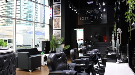 Elegant salon space at Barbarco in Dubai, Dubai, AE, featuring modern decor and comfortable seating.